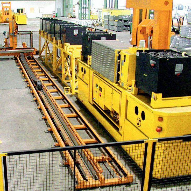 Les mâts de levage WINKEL Équipements pour véhicules de transports automatiques · Pour remplacement automatique d'accumulateurs · Capacité de 2.500 kg